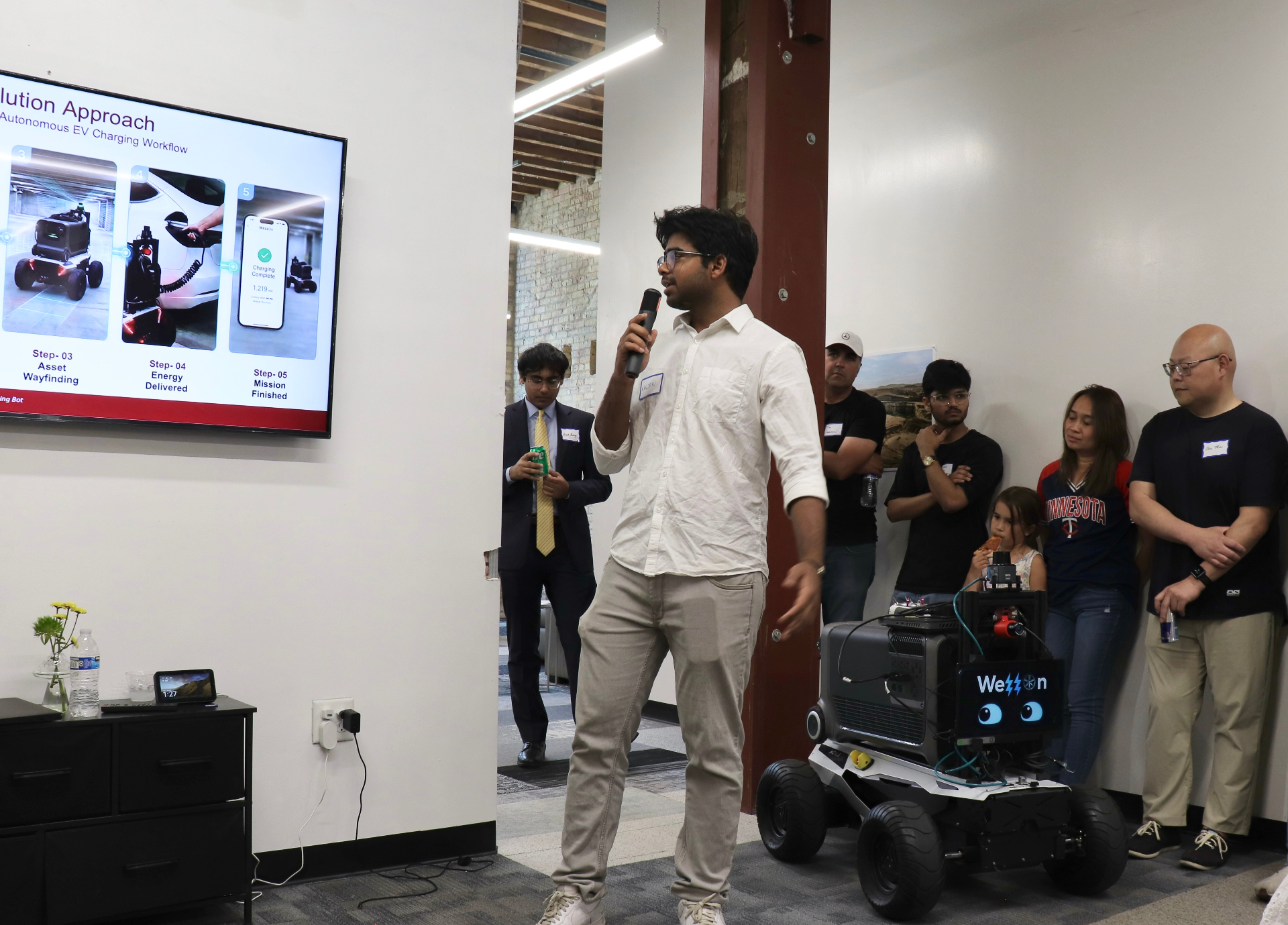 Founder pitching at The House with autonomous robot demo