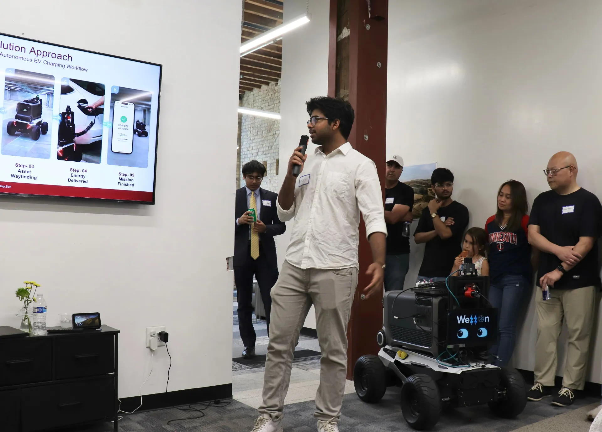 Founder pitching at The House with autonomous robot demo
