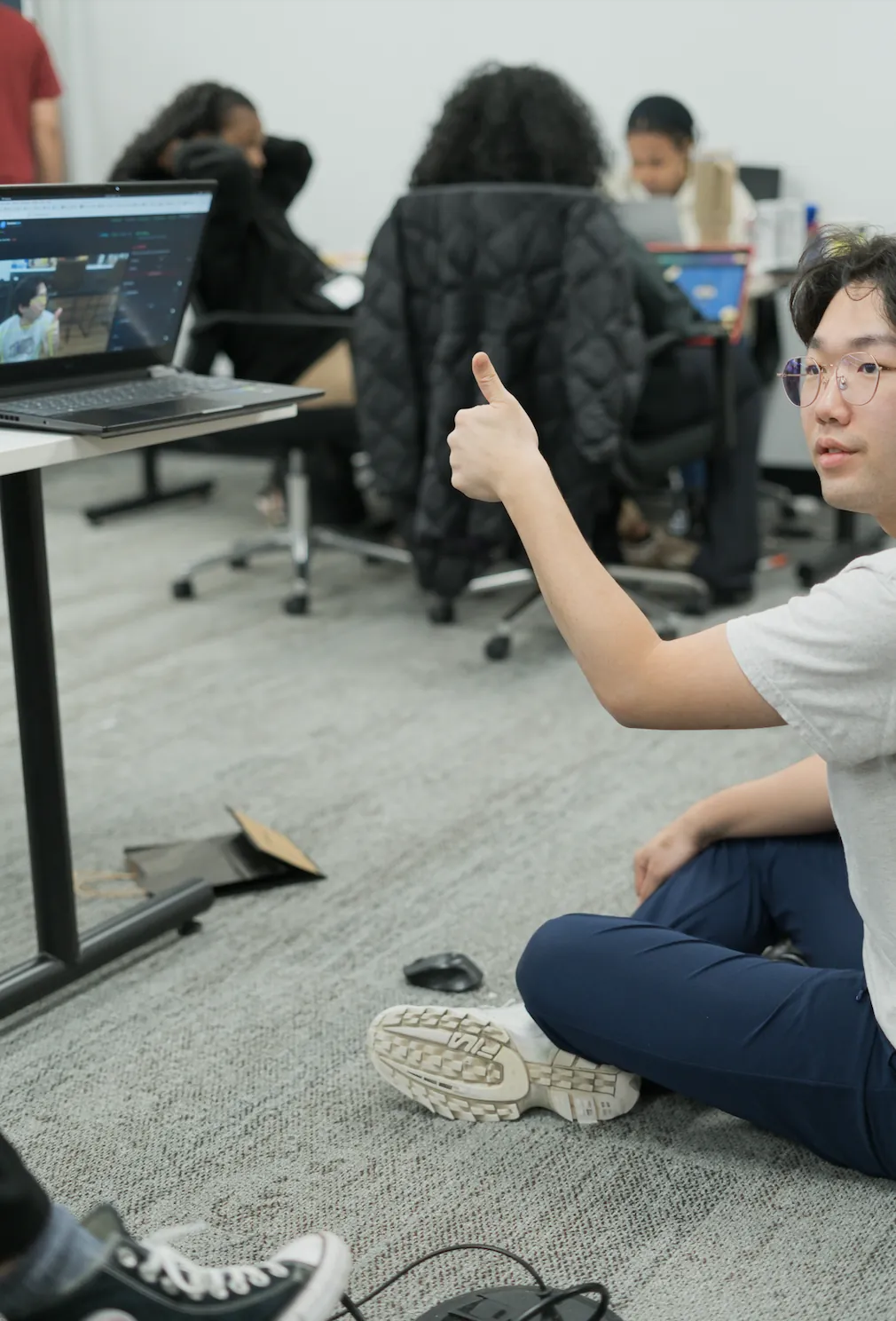 Builder giving a thumbs up during a working session