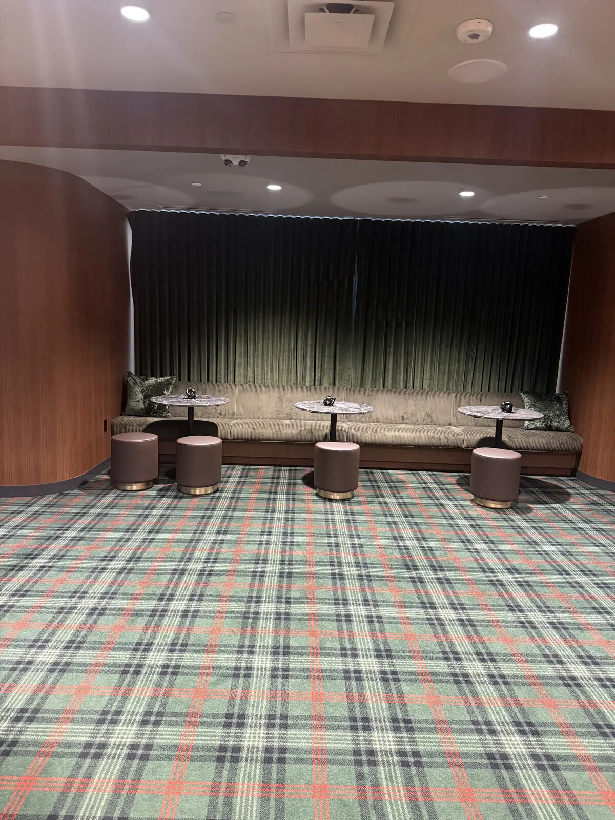 Theater stage and lounge seating for the Origin Story launch night